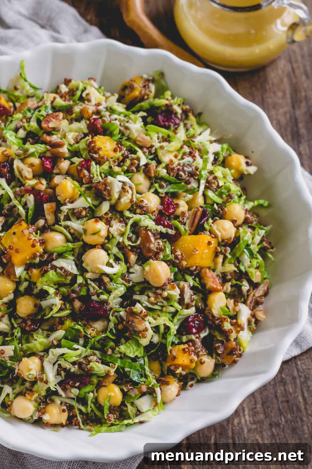 Roasted Brussels Quinoa Harvest Bowl 9 Overhead shot of a bowl of warm quinoa Brussels sprouts salad, artfully arranged.