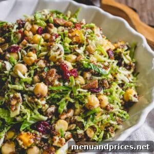 Warm quinoa Brussels sprouts salad with chickpeas in a bowl.