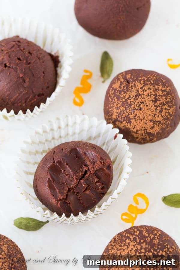 Aromatic Orange Cardamom Delights 7 Delicious homemade dark chocolate orange cardamom truffles dusted with cocoa