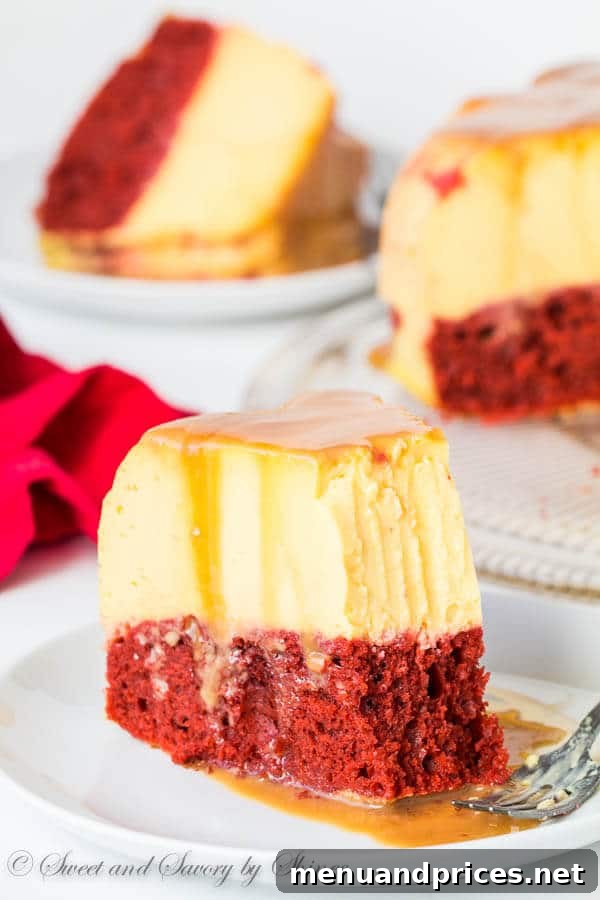 Whole Magic Red Velvet Flan Cake inverted on a serving platter, topped with glistening caramel sauce