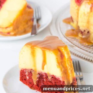 A beautifully layered Magic Red Velvet Flan Cake, distinctly showcasing its vibrant red cake layer and creamy flan on a serving plate.