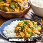 Finished Bok Choy and Chicken Curry served elegantly on a plate with fresh rice.