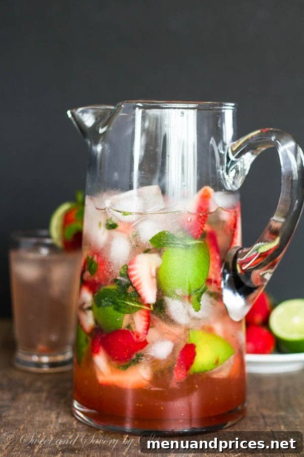 Refreshing Spring Dishes Bursting with Flavor 14 Large batch of refreshing strawberry mojito with fresh mint and lime.