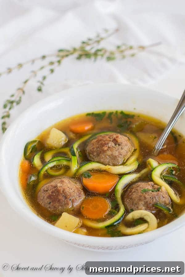 Loaded with vegetables and homemade meatballs, this light, yet hearty soup comes together in less than 45 minutes. Great weeknight and weekend dinner!