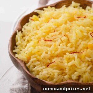 Sun-Drenched Saffron Rice 9 Saffron Rice in wooden bowl