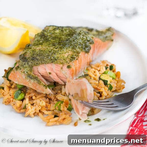 Baked salmon dinner with fried rice and lemon