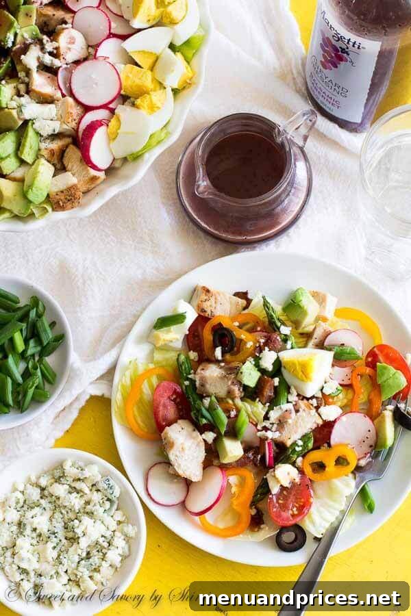 Close-up of a hearty serving of Spring Cobb Salad ready to be enjoyed