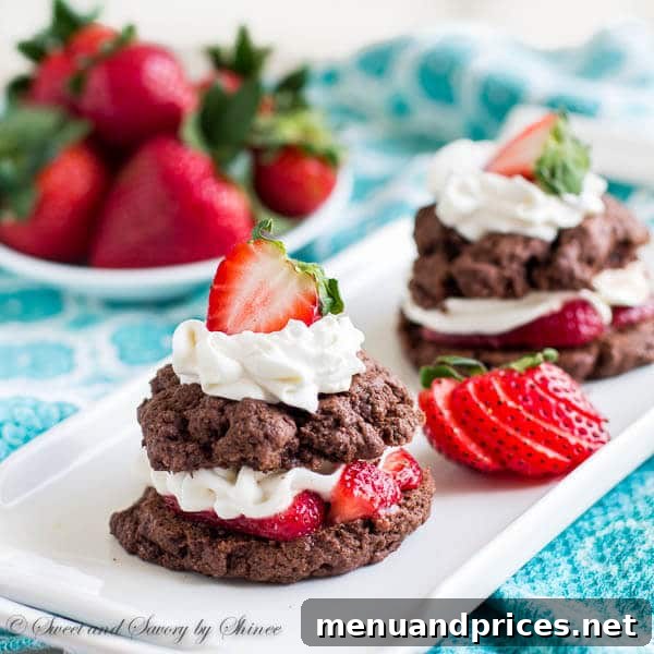 Velvet Berry Chocolate Stacks 6 Beautifully arranged chocolate strawberry shortcakes, highlighting the fresh, juicy strawberries and creamy texture