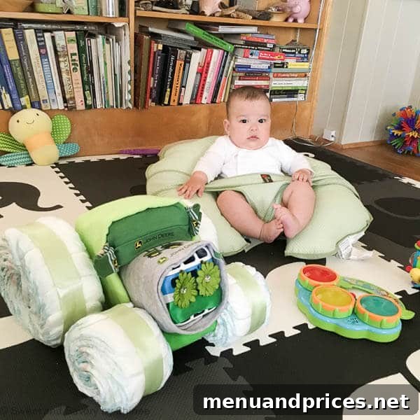 Grant's World at Five Months 4 A festive John Deere themed diaper cake, a thoughtful and creative gift for a baby.
