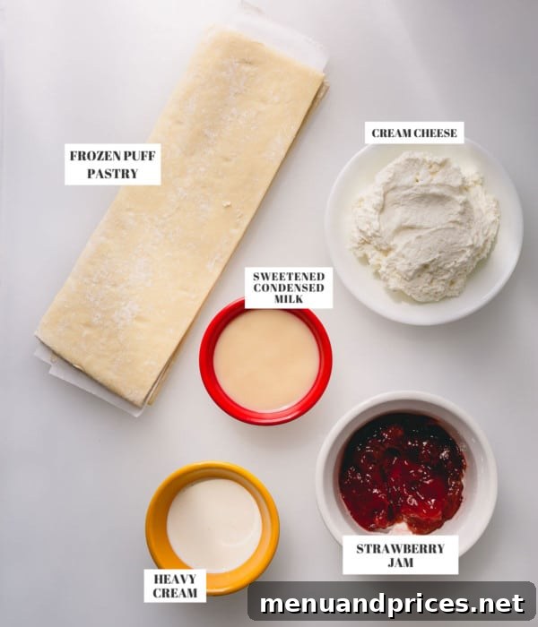 Individual ingredients for strawberry cheesecake tart: cream cheese, sweetened condensed milk, strawberry jam, and a sheet of puff pastry.