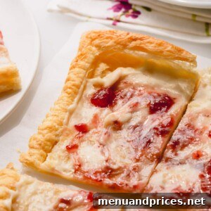 Homemade Strawberry Cheesecake Tart, ready to slice and serve.