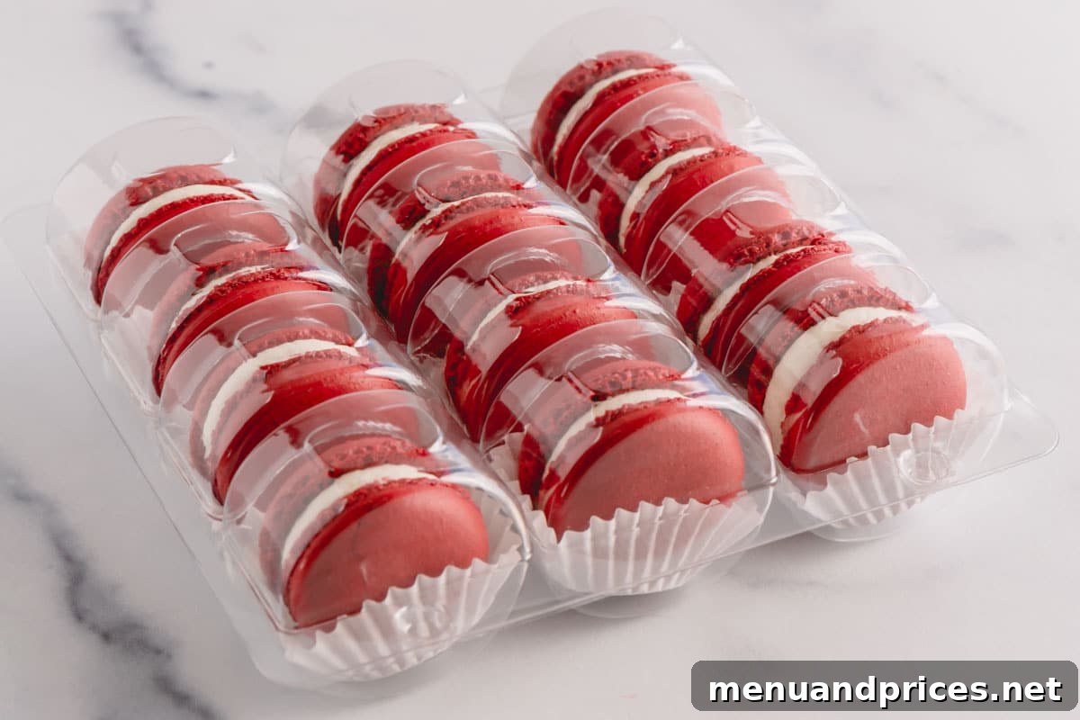 Assembled macaron shells in a clamshell macaron container, demonstrating storage method.