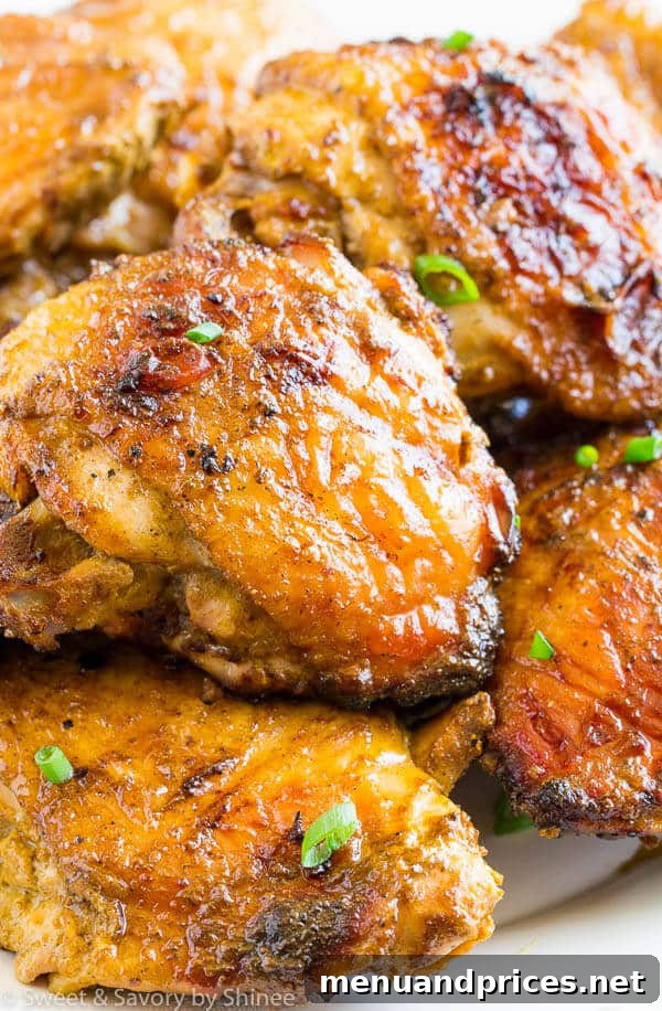 Effortless 4-Ingredient Grilled Curry Chicken Thighs 2 Perfectly grilled, juicy, and flavorful curry chicken thighs, requiring only 4 ingredients for a quick and easy meal.