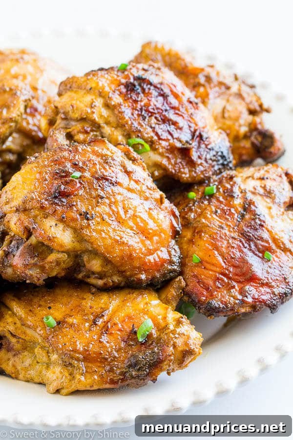 Effortless 4-Ingredient Grilled Curry Chicken Thighs 3 A second image of the appetizing grilled curry chicken thighs, highlighting their perfectly cooked and spiced exterior.